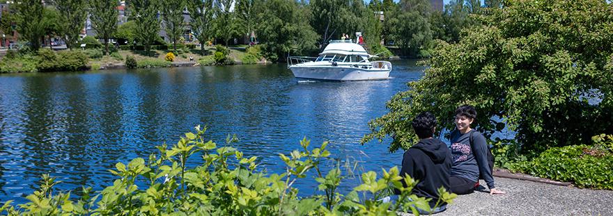 students talking by the ship canal